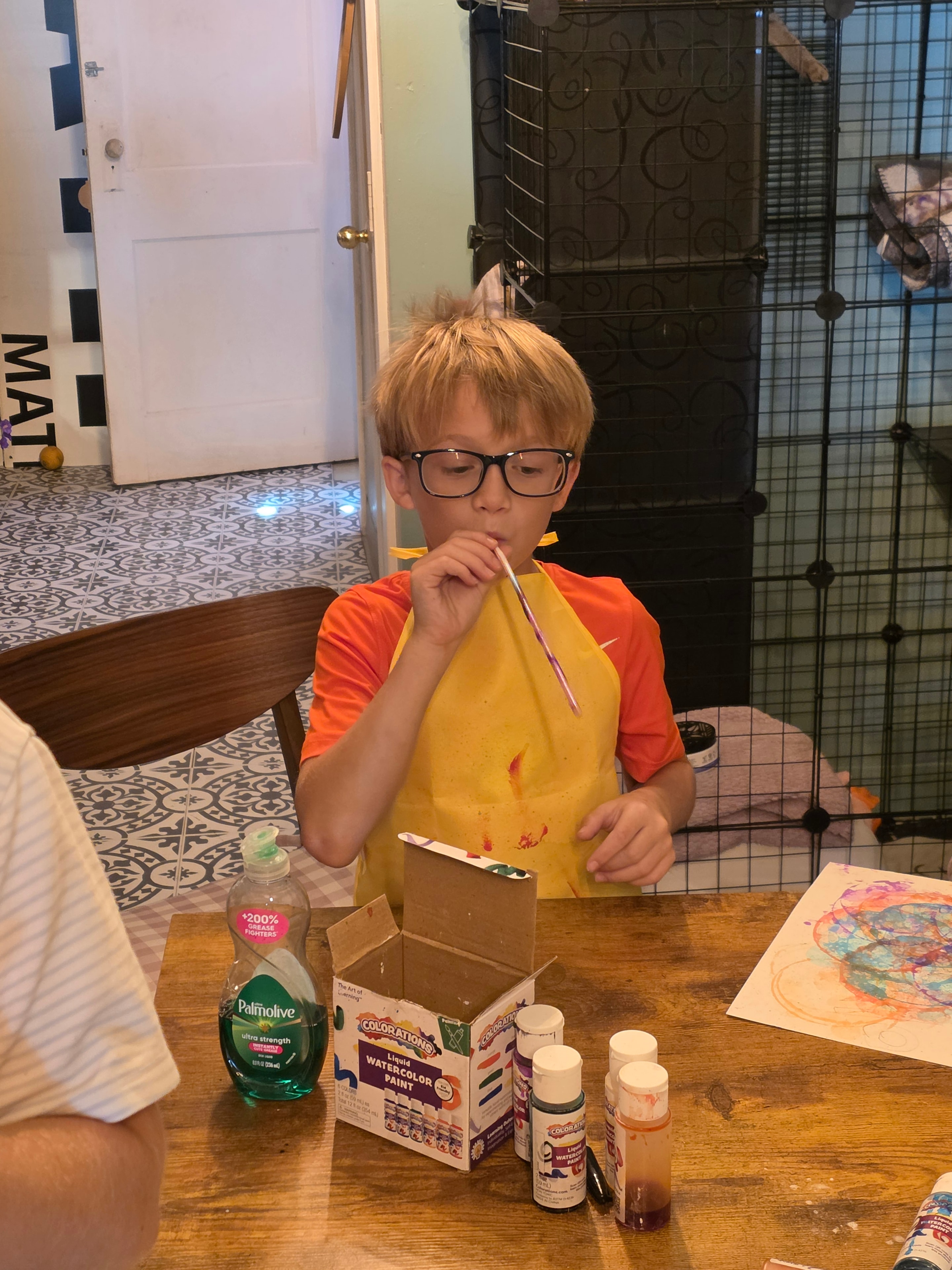 Student painting with watercolors at Focus Microschool