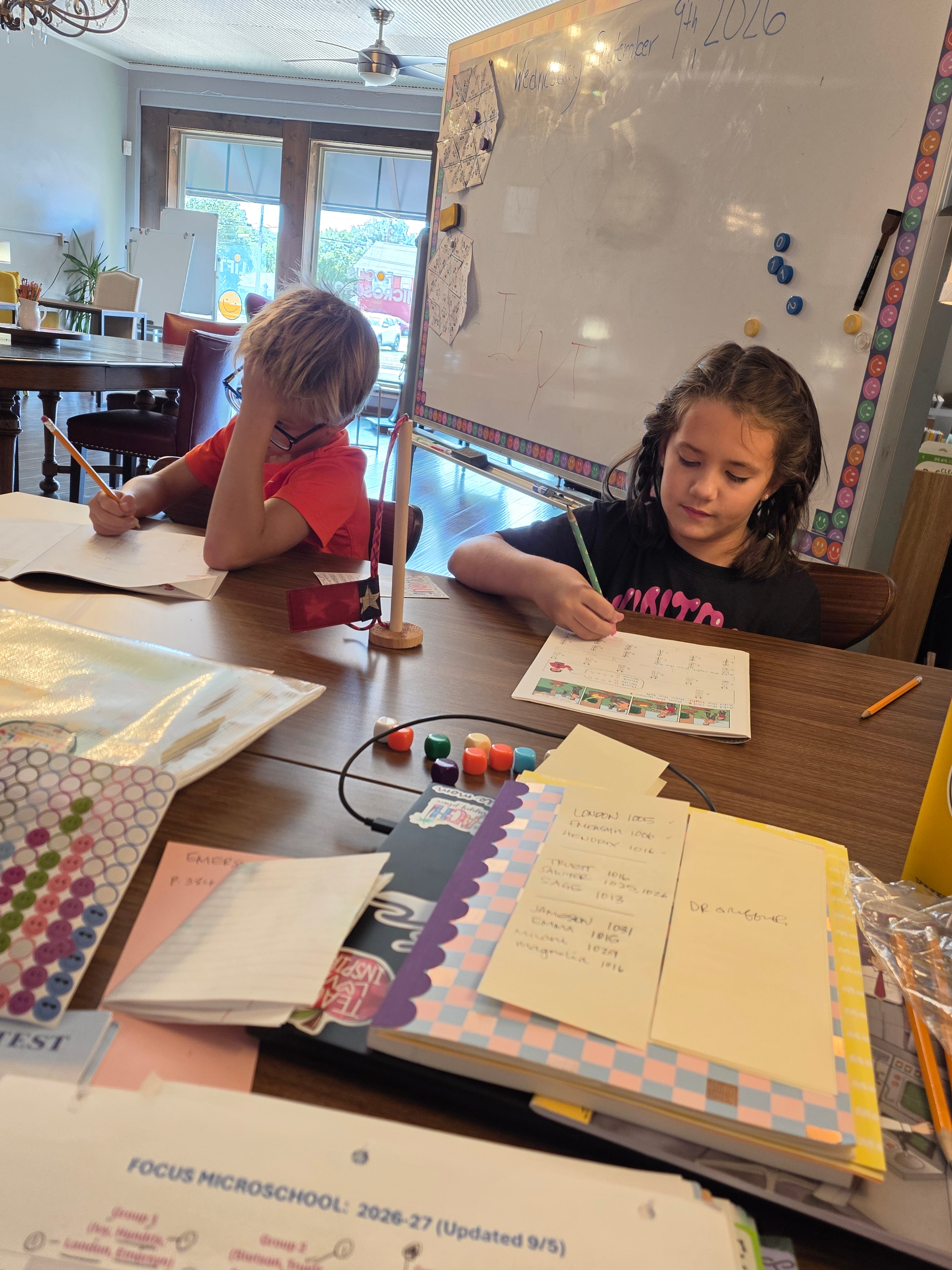 Students working on a project at their desks at Focus Microschool