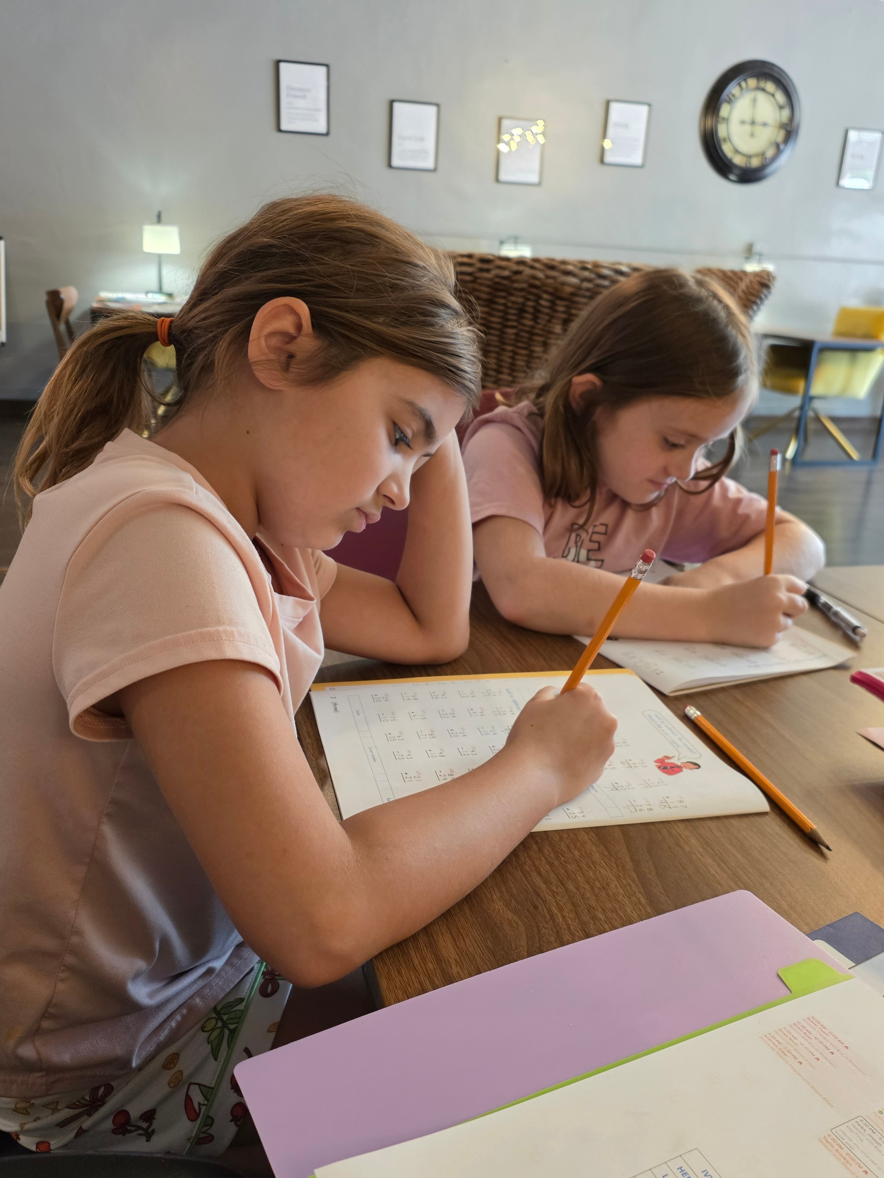 Students doing math work together at Focus Microschool